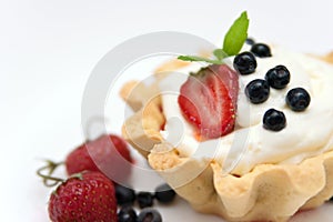 Delicious tart with berries and cream