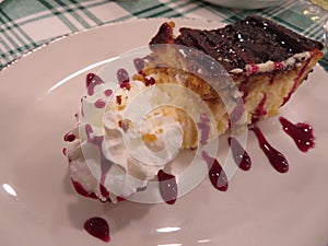 Delicious tasty cheesecake sweet whipped raspberry sauce photo