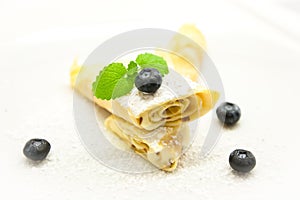 Delicious Tasty Homemade crepes or pancakes with blueberries.