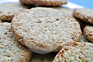 Delicious, tasty, sweet brown cookies, made with oatmeal and white wheat integral whole grain flour, sweets, sweetmeats, food