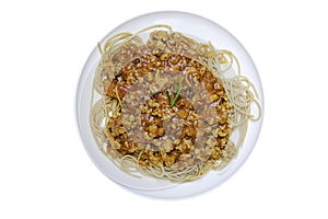 Delicious tasty yummy spaghetti with minced pork tomato sauce and green rosemary in white plate on white background