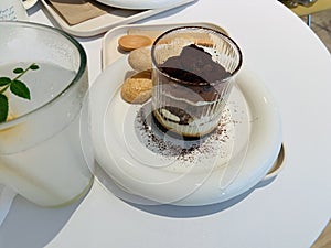 Delicious tiramisu and ladyfingers paired with lemon Calpis and Americano coffee