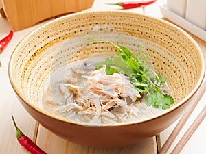Delicious Tom Kha soup with coconut milk chicken and mushrooms. Asian cuisine