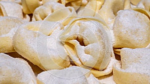 Delicious tortellini a ring-shaped pasta from Italy. Traditionally they are stuffed with a mix of meat, parmigiano reggiano cheese