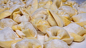 Delicious tortellini a ring-shaped pasta from Italy. Traditionally they are stuffed with a mix of meat, parmigiano reggiano cheese