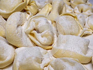 Delicious tortellini a ring-shaped pasta from Italy. Traditionally they are stuffed with a mix of meat, parmigiano reggiano cheese