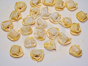 Delicious tortellini a ring-shaped pasta from Italy. Traditionally they are stuffed with a mix of meat, parmigiano reggiano cheese