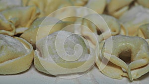 Delicious tortellini a ring-shaped pasta from Italy. Traditionally they are stuffed with a mix of meat, parmigiano reggiano cheese