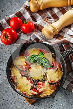 delicious traditional Italian dish parmigiana di melanzane photo
