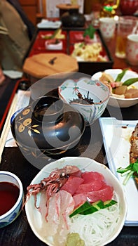 A delicious traditional japanese dinner with several dishes