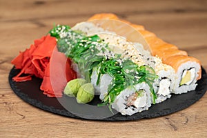 delicious traditional Japanese sushi and rolls on a plate