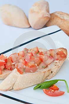 Delicious traditional Mediterranean bread with tomato and olive oil