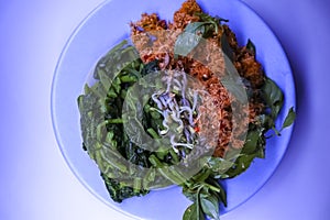 Delicious traditional mix vegetables with coconut from java called urap urab or kluban photo