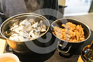 Delicious traditional mussels with roquefort cheese and french fries dish close up view