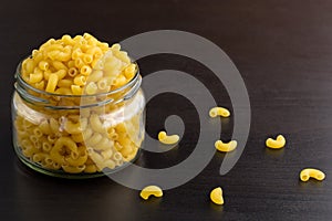 Delicious traditional pasta horns macaroni in the glass jar