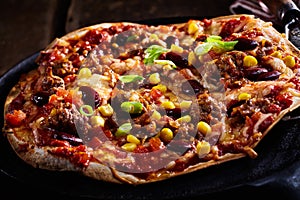 Delicious traditional Tex-Mex tortilla pizza photo