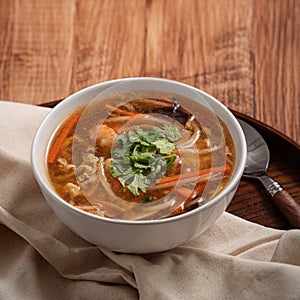 Delicious traditional thick soup with shrimp meat ball and vegetables