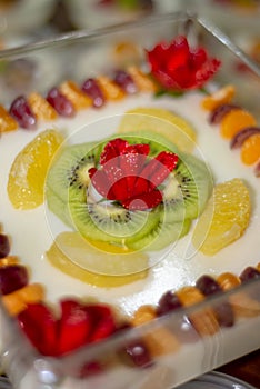 Delicious tropical fresh fruit pudding on table