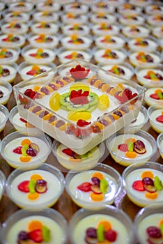 Delicious tropical fresh fruit pudding on table