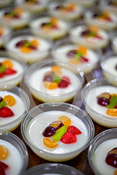 Delicious tropical fresh fruit pudding on table