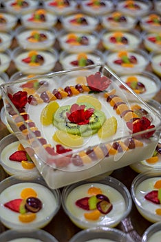 Delicious tropical fresh fruit pudding on table