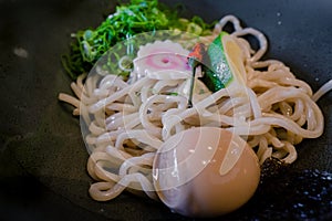 Delicious tsukemen ramen served with hot pork base dip sause