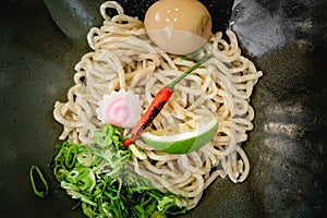 Delicious tsukemen ramen served with hot pork base dip sause