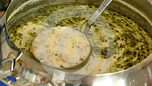 Delicious turkish style yayla yoghurt soup with mint in close-up