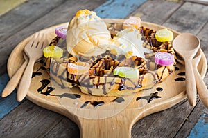 Delicious vanilla ice cream with waffle