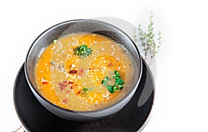 Delicious vegetable potato soup served in a bowl