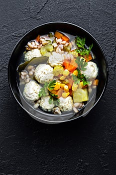 Delicious vegetable soup with chicken meatballs and pearl barley