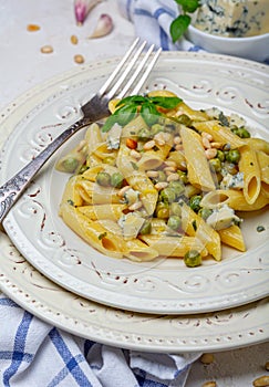 Delicious vegetarian pasta with green peas sauce
