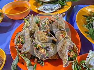 Delicious Vietnamese snails dish cooked with chili and peppercorn