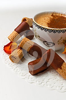 delicious wafers with chocolate , coffee with cinnamon, rose