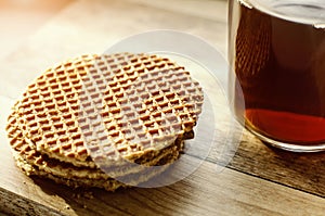 Delicious waffles with tea. Close-up