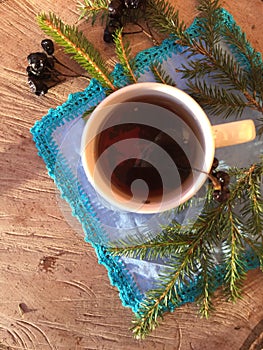 Delicious warm tea in winter background