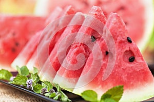Delicious watermelon slices on a table - close up