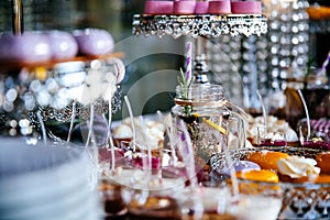 Delicious wedding reception candy bar dessert table