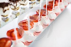 Delicious wedding reception candy bar dessert table