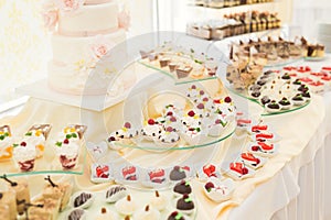 Delicious wedding reception candy bar dessert table