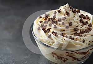 Delicious whipped cream dessert topped with chocolate shavings