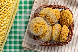 Delicious yellow cookie and corn cob. Sweet food of Festa Junina, a typical brazilian party.