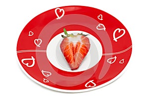 Deliciously half a red strawberry romantic plate