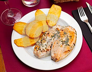 Deliciously steak of baked salmon with potatoes