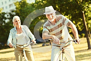 Delighted aged man being in happy mood