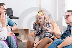 Delighted attractive woman laughing