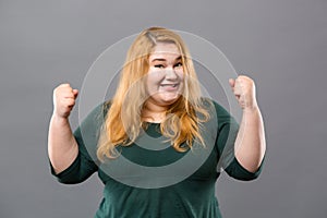 Delighted cheerful woman feeling happy