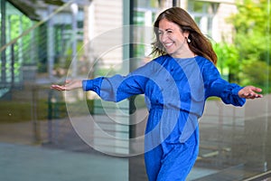 Delighted enthusiastic woman holding open her arms