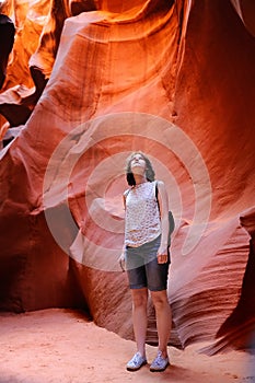 Delighted female tourist in Lower Antelope Canyon