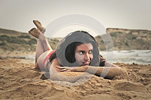 Delighted girl at the beach